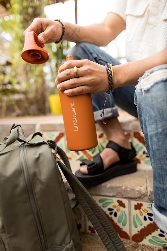LifeStraw Go Series – Insulated Stainless Steel Water Filter Bottle for Travel and Everyday Use, Removes Bacteria, Parasites and Microplastics, Improves Taste, 24oz Thistle Purple