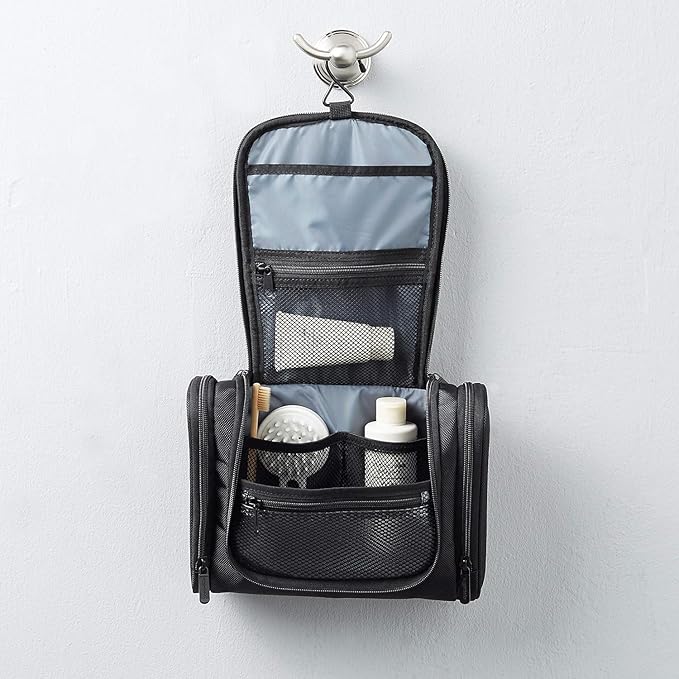 Amazon Basics Travel Toiletry Bag for Men and Women, Hanging Toiletry Bag, Dopp Kit with 2 Side Pockets, Multiple Interior Pockets, Durable 1680D Polyester, Handles Bathroom Spills/Splashes, Black