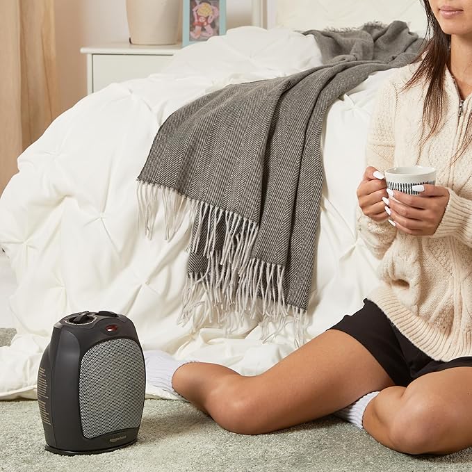 Amazon Basics Oscillating Ceramic Space Heater, Portable Indoor Heating Solution, With Overheat and Tip-Over Protection, Thermostat, 1500W, 7.52"D x 6.34"W x 9.45"H, Black